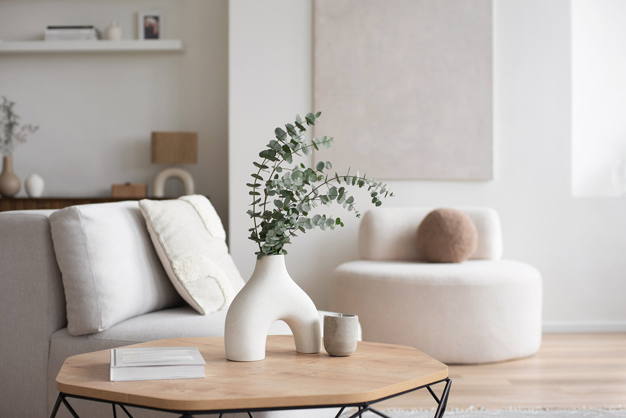 Chair with pillow, coffee table, vase in a living room stock photo